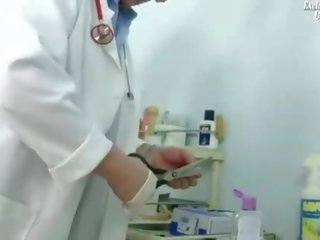 Pervertida md examining sua paciente